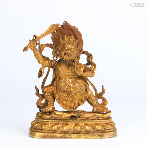 A GILT-BRONZE BUDDHA STATUE