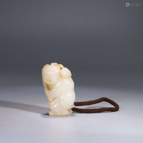 A HETIAN JADE CARVED BOY PENDANT