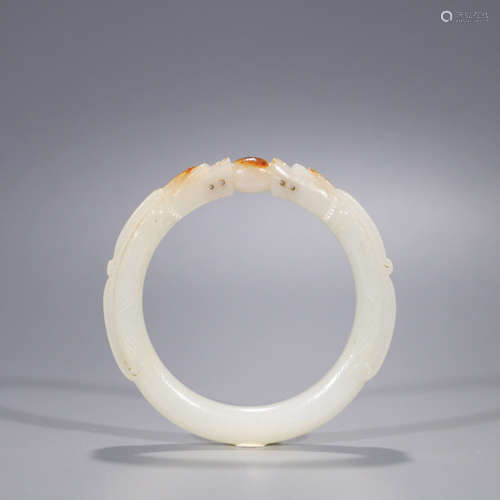 A CHI-DRAGON PATTERN WHITE HETIAN JADE BRACELET