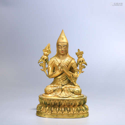 A GILT-BRONZE BUDDHA STATUE