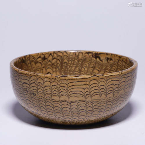 A TWISTED TIRE GLAZE PORCELAIN BOWL