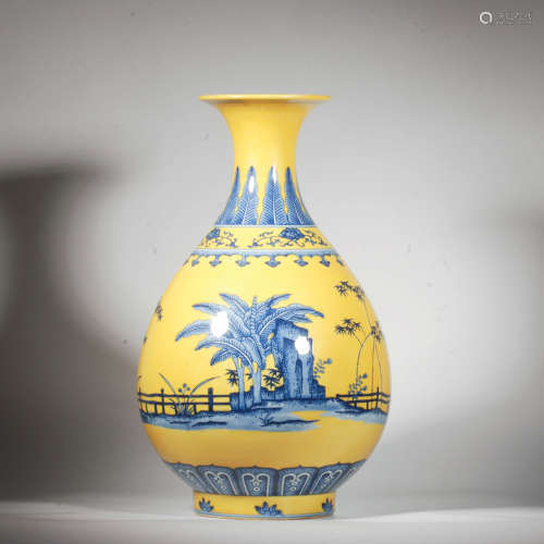 A YELLOW GROUND BLUE AND WHITE PAINTED PORCELAIN VASE