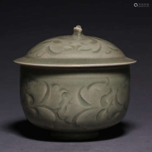 A YAOZHOU KILN FLORAL CARVED PORCELAIN JAR WITH COVER