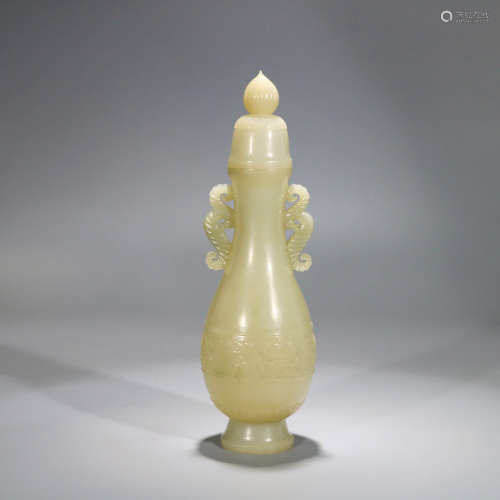 A HETIAN JADE CARVED FLORAL DOUBLE-EARED VASE