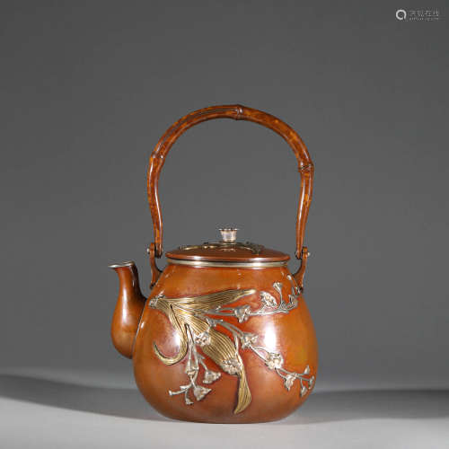 Qing Dynasty Teapot with Silver Figure