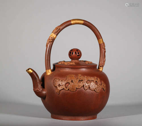 Gold-clad and Engraved Purple Clay Teapot in Qing Dynasty