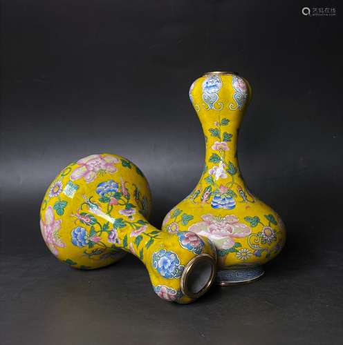 A PAIR OF PAINTED ENAMEL VASES