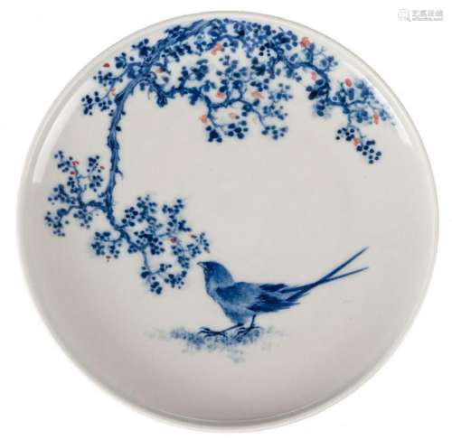 A CHINESE BLUE AND WHITE FLORAL AND BIRD DISH