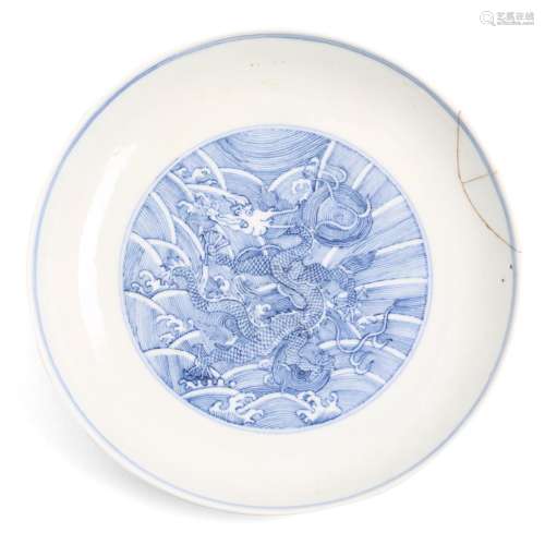 A CHINESE BLUE AND WHITE DRAGON DISH