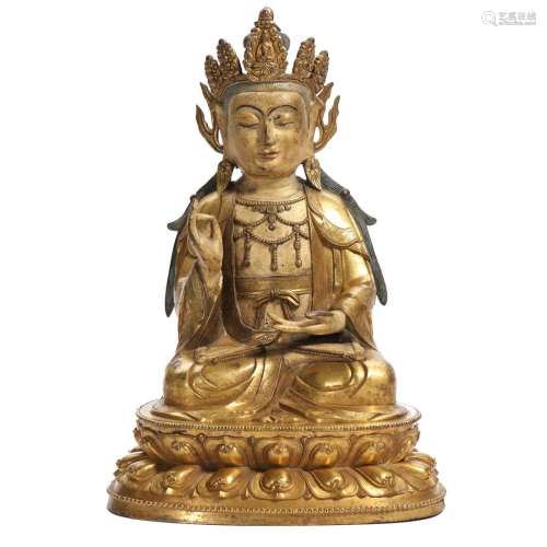 A  GILT-BRONZE FIGURE OF SEATED GUANYIN