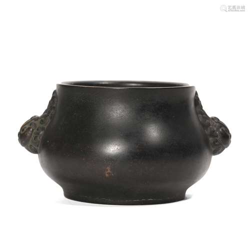 A CHINESE BRONZE CENSER WITH BEAST HANDLES