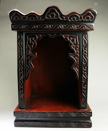 A Carved Lacquer Altar Buddha Cabinet