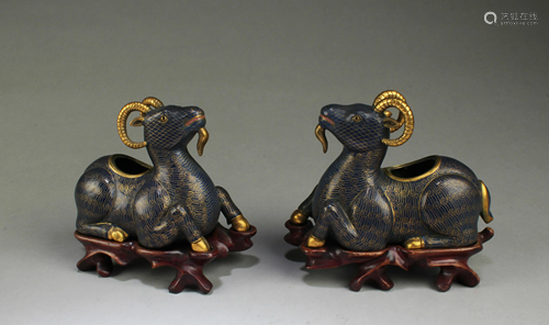 A Pair of Cloisonne Goat Shaped Statues