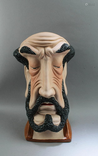 A Porcelain Head Figurine