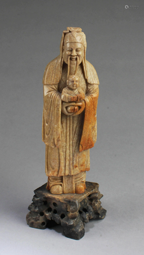 A Carved Soapstone Figurine