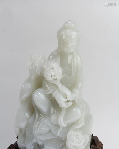 A Carved Nephrite Jade Guanyin Statue.