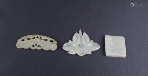 A Group of Three Jade Pendants