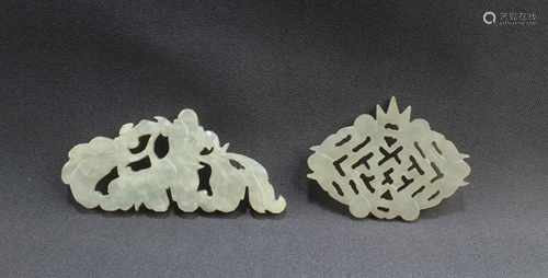 A Group of Two Jade Pendants