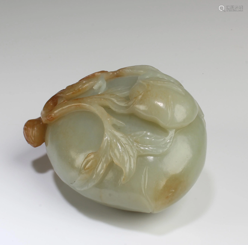 A Carved Jade Peach-shaped Ornament