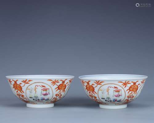 A pair of Qing Daoguangfan red bowls with ancient patterns