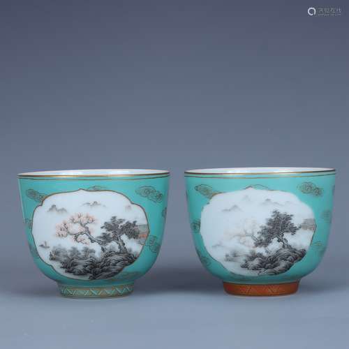 A pair of blue and ink-painted landscape-patterned cups in Y...