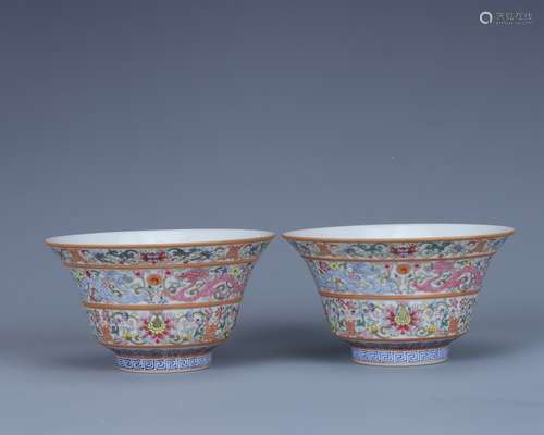 A pair of famille rose and dragon cups in the Jiaqing period...