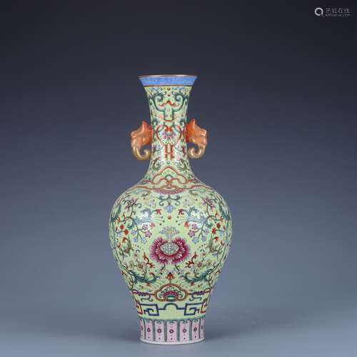 Qing Dynasty Qianlong yellow ground famille rose double-eare...