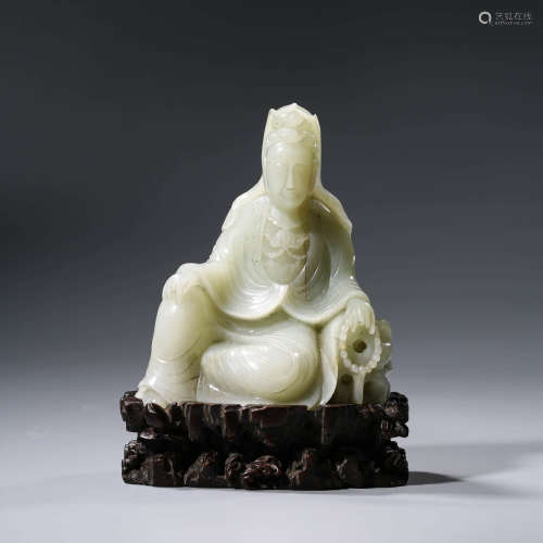 A CHINESE WHITE JADE AVALOKITESHVARA STATUE