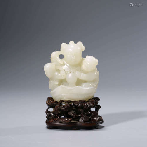 A CHINESE WHITE JADE CHILDREN ORNAMENT AND STAND