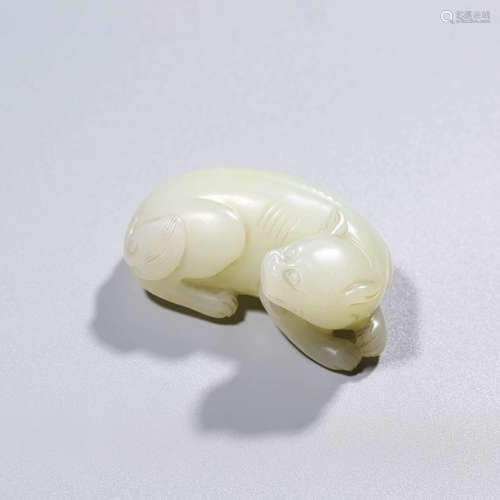 A CHINESE WHITE JADE BEAST ORNAMENT