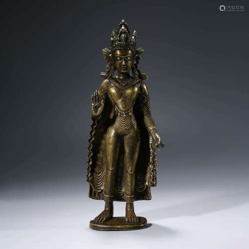 A CHINESE GILT-BRONZE AVALOKITESHVARA STATUE