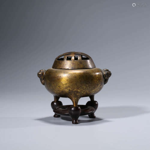 A CHINESE BRONZE TRIPOD CENSER AND STAND