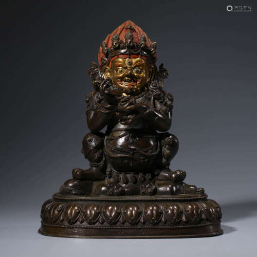 A CHINESE BRONZE MAHAKALA STATUE