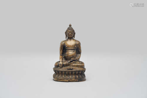 A brass figure of Buddha Vajrasana