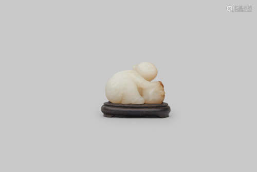 A white jade figure of Liu Hai