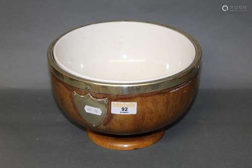 A late Victorian oak circular fruit bowl with silver-plated ...