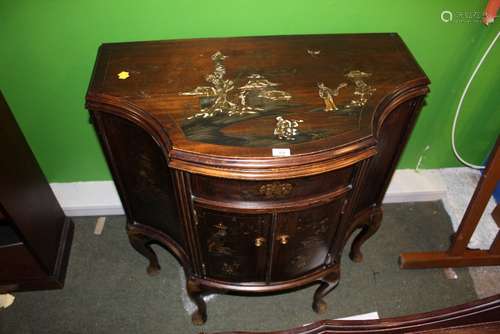 A 1920's brown lacquered bow front gramophone cabinet of chi...