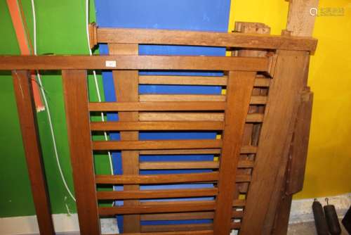 An Arts and Crafts light oak double bed of Arts and Crafts d...
