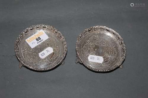 A pair of Prata white metal circular pin dishes with cast pi...