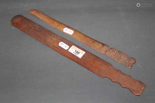 An oriental carved and stained wood page turner, 36 cm long ...