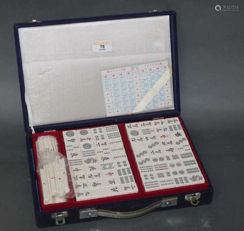 A cased complete Mahjong set, with blue cloth case 29 cm wid...