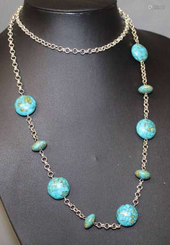 A turquoise and white metal bead necklace,