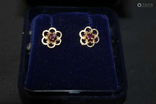 A pair of 9ct gold and garnet floral earrings