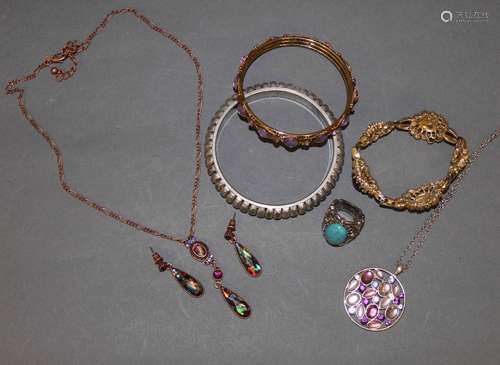 A quantity of costume jewellery including bangles,