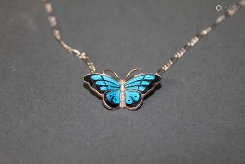 A Norwegian enamelled silver butterfly pendant and chain, th...