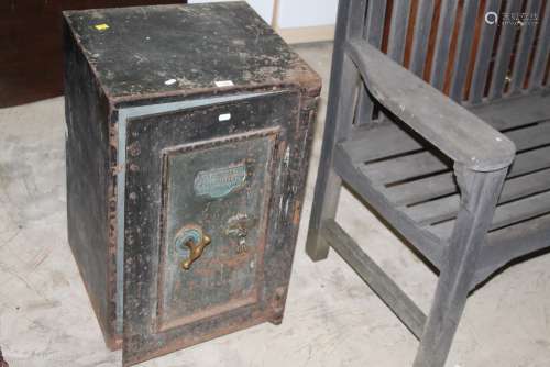 A late Victorian Whittingham & Co dark green painted cast ir...