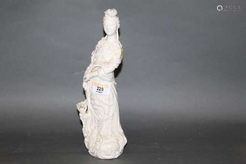 A continental Blanc De Chine slip cast porcelain figure of Q...