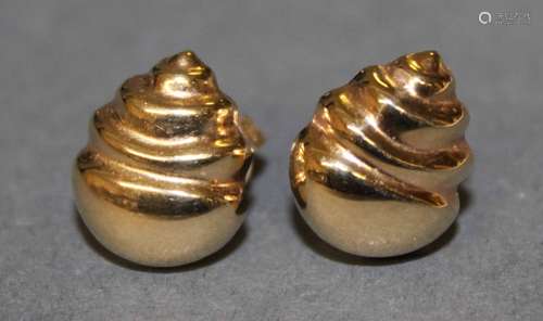 A pair of gold coloured metal (thought 9ct) shell pattern ea...