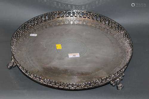 A 19th century silver plated circular tray with pierced rim ...