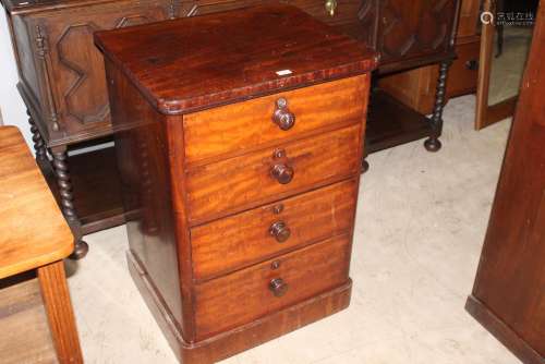 An early Victorian figured mahogany pier chest with rounded ...